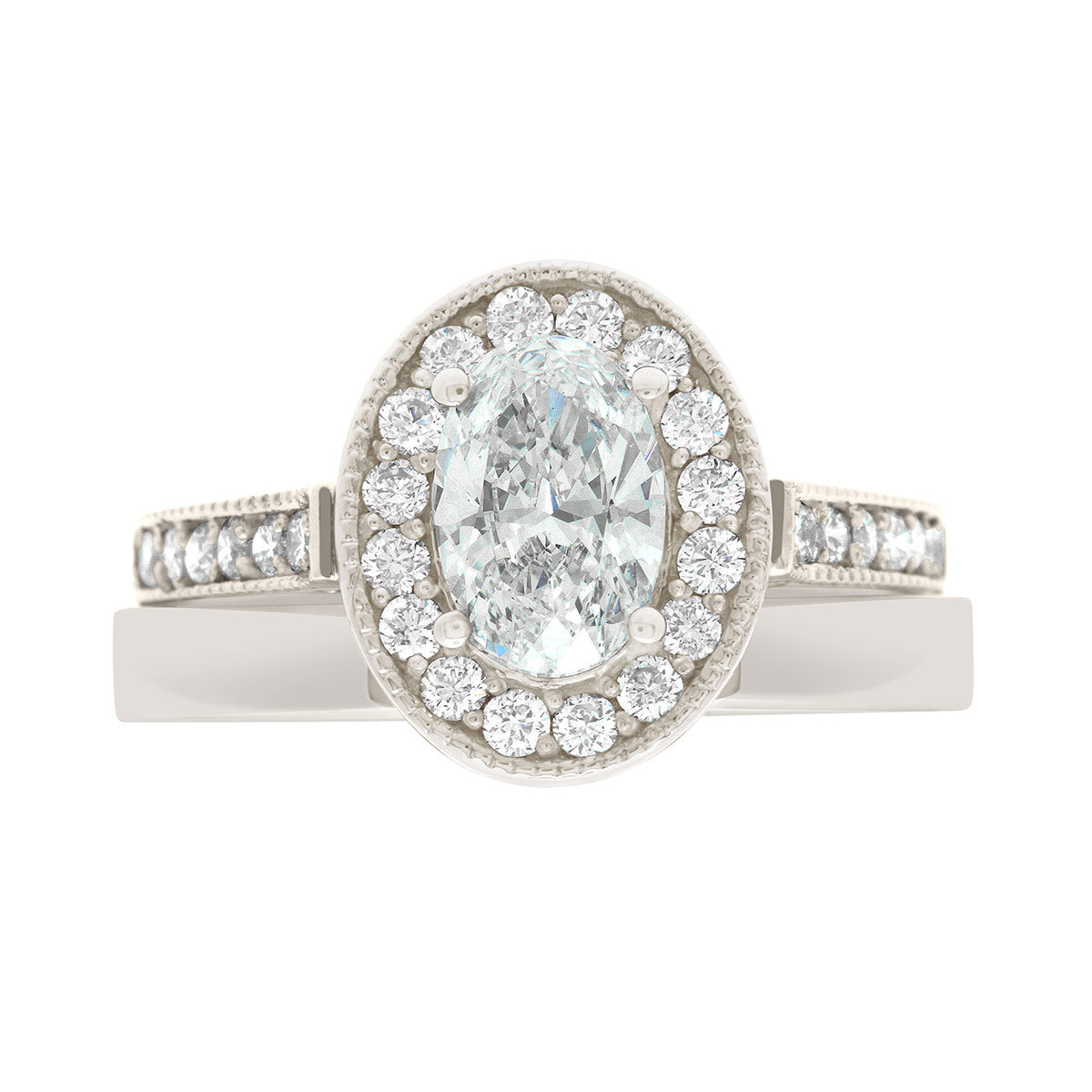 Antique Oval Engagement Ring in white gold with a matching Platinum wedding ring