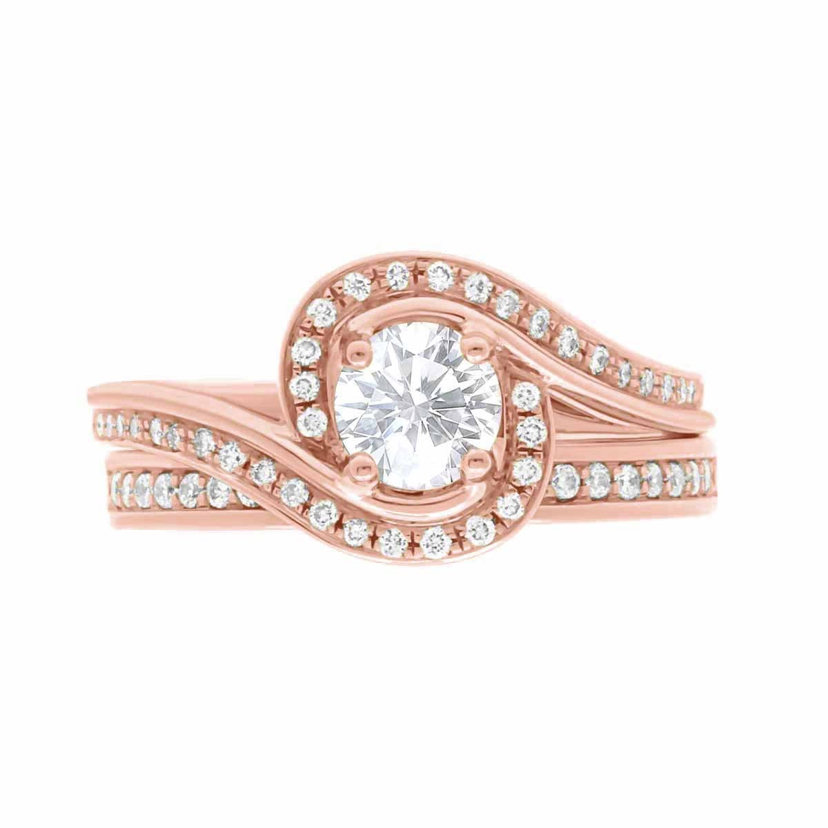 Contemporary Style Engagement Ring in rose gold, with a matching diamond wedding ring, lying flat, with a white background.
