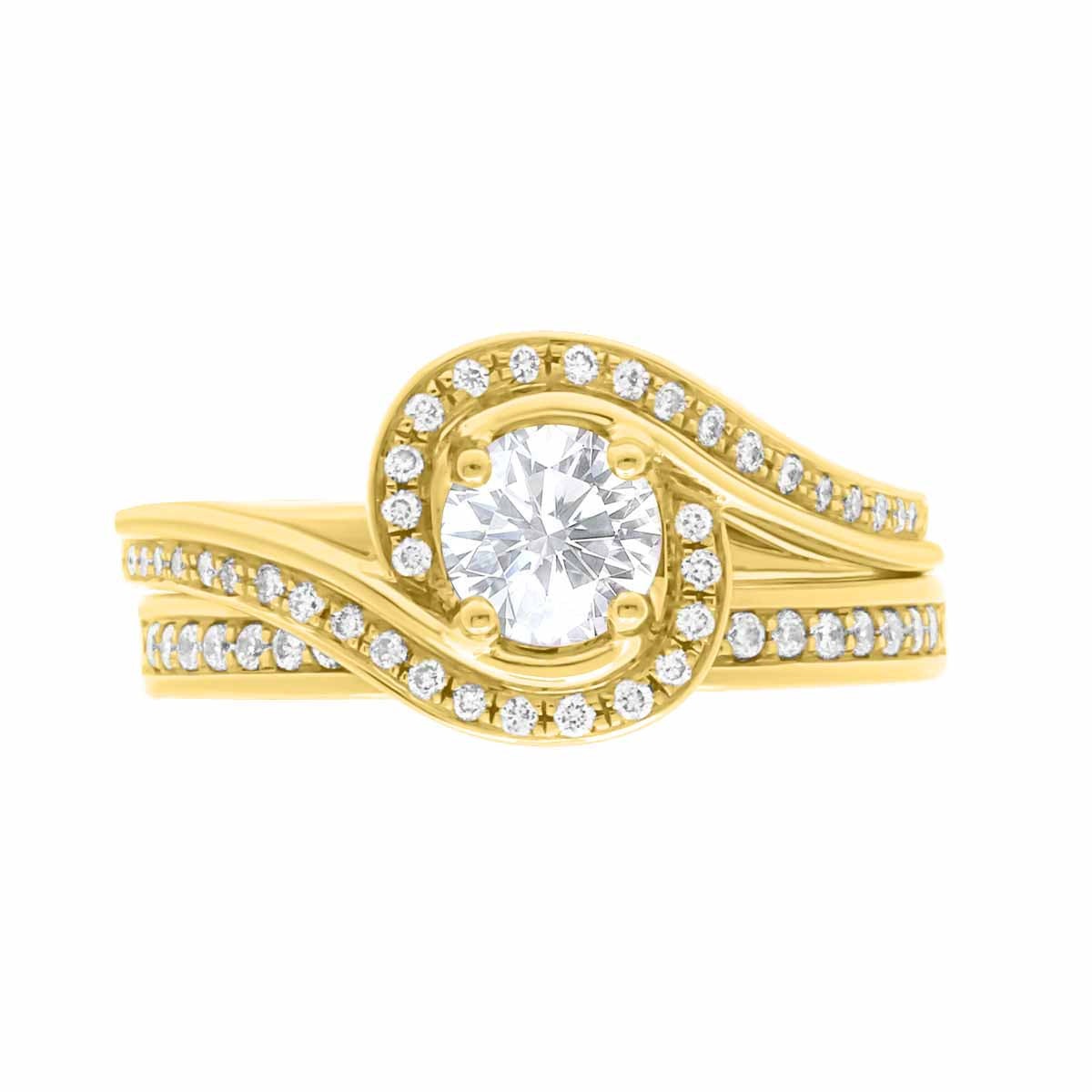 Contemporary Style Engagement Ring in yellow gold, lying flat, with a matching diamond set wedding ring, with a white background
