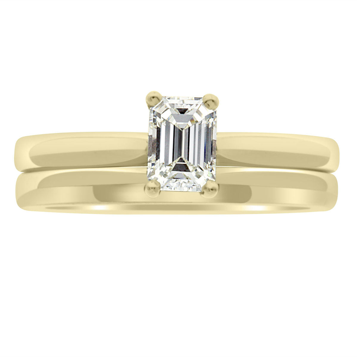 Emerald Cut Ring Solitaire Engagement Ring in yellow gold with a matching plain wedding ring