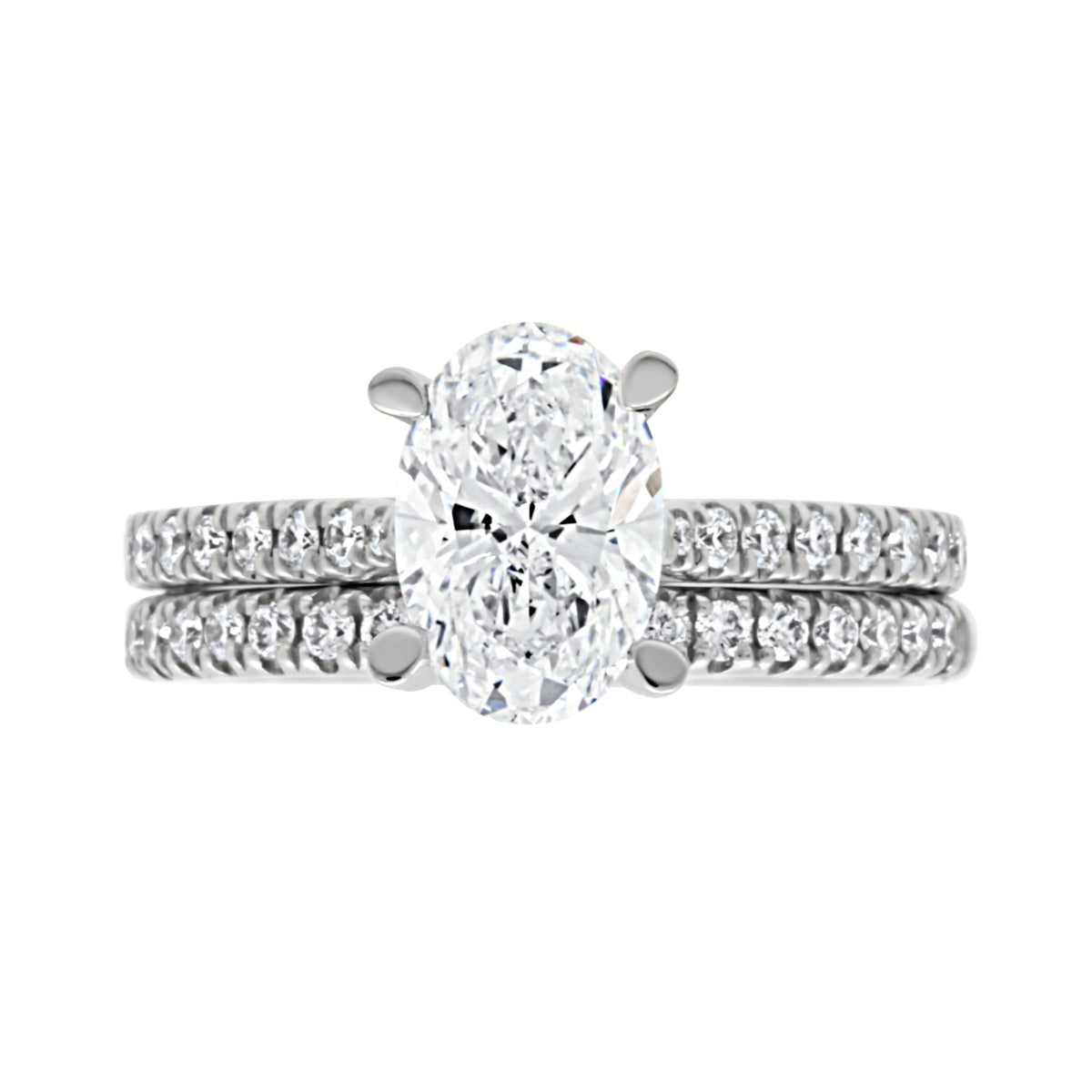 Diamond ring with a oval-shaped center stone on a white background