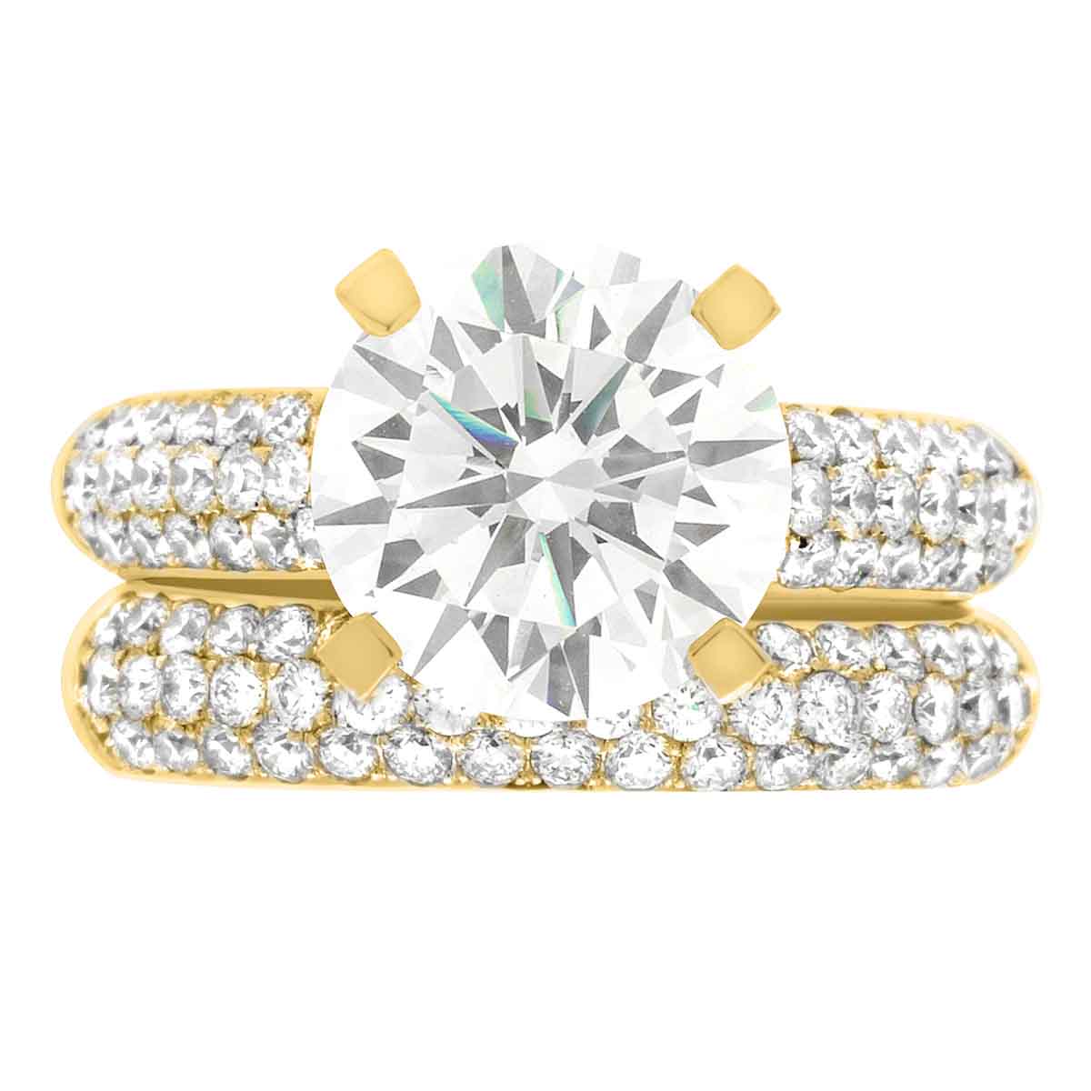 Bespoke Diamond Ring made from yellow gold pictured with a diamond wedding ring