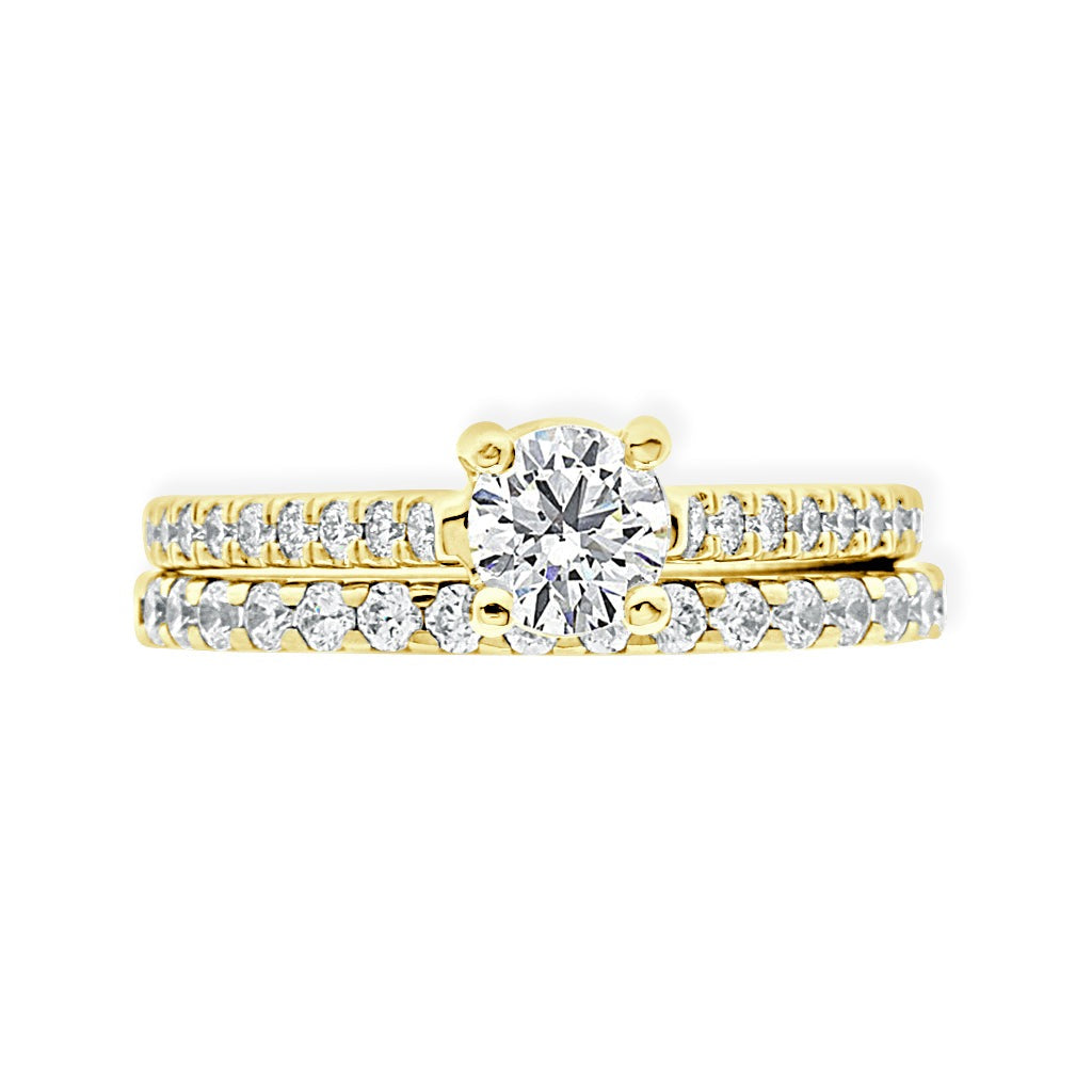 Castell Set Diamond Ring in yellow gold with matching diamond wedding ring