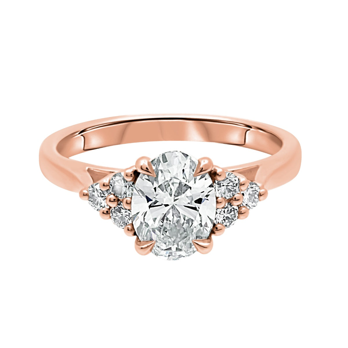 Oval Diamond Handmade Engagement Ring in rose gold on a white background