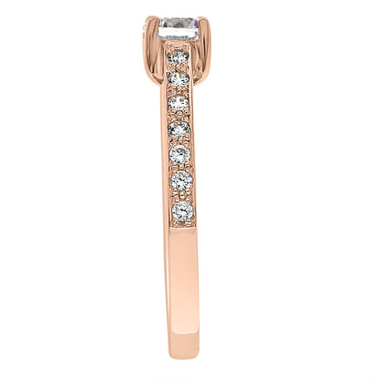Princess Cut Bezel Ring set in rose gold and standing upright ina side view