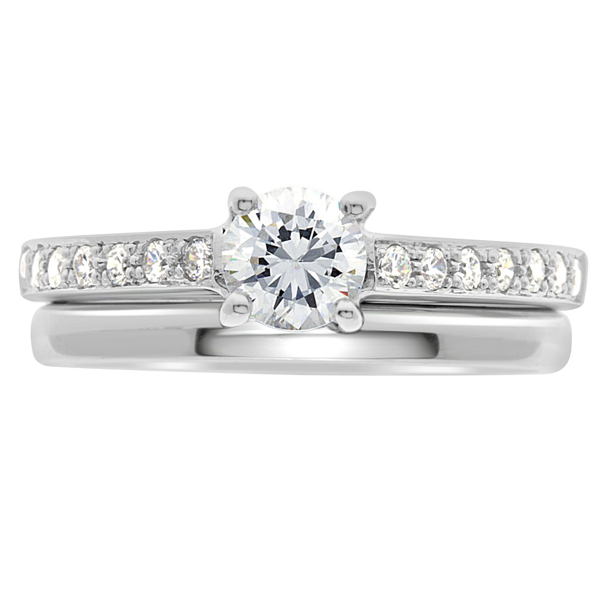 Pavé Diamond Ring manufactured in white gold with a plain wedding ring