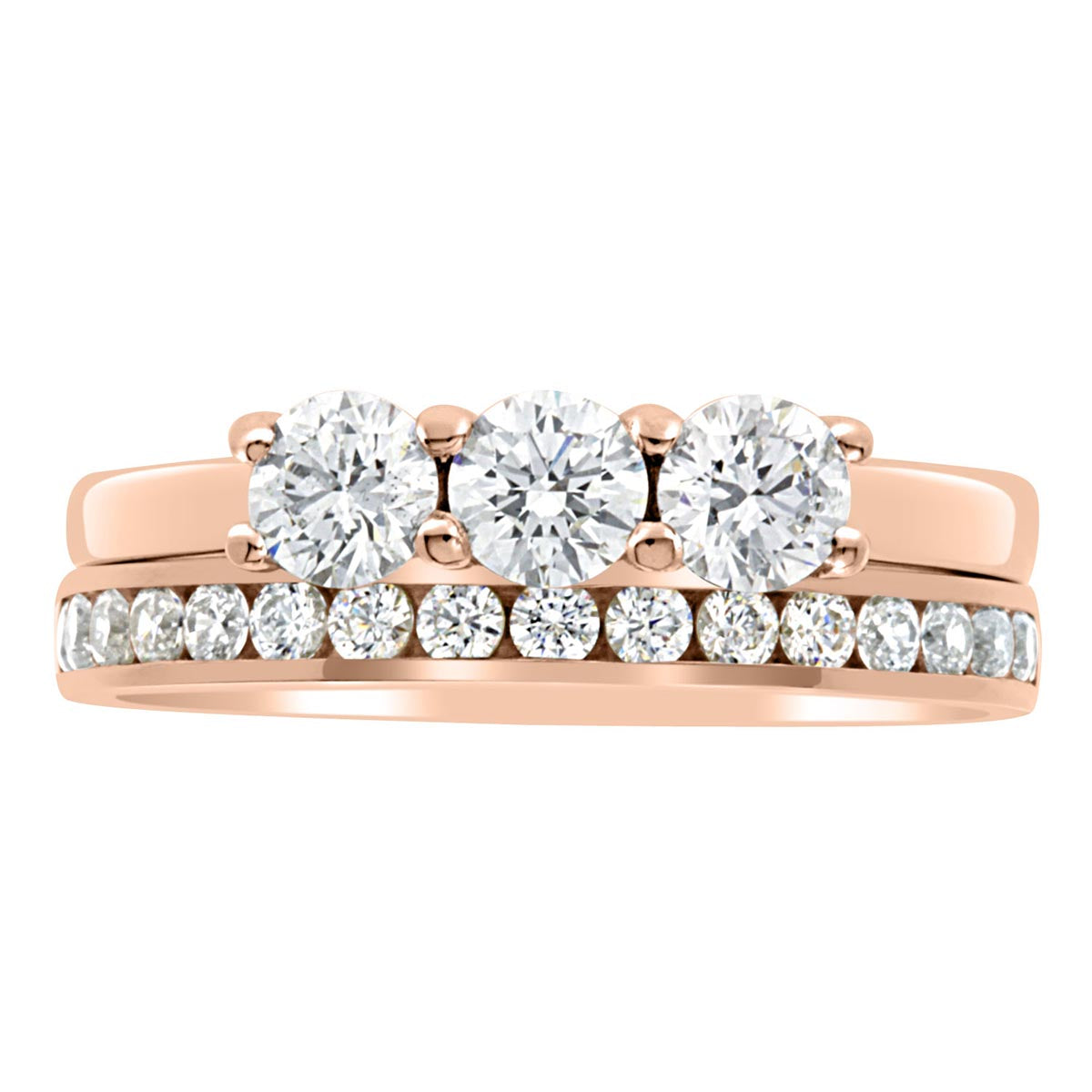 Three Stone Engagement Ring made of rose gold with a diamond wedding ring