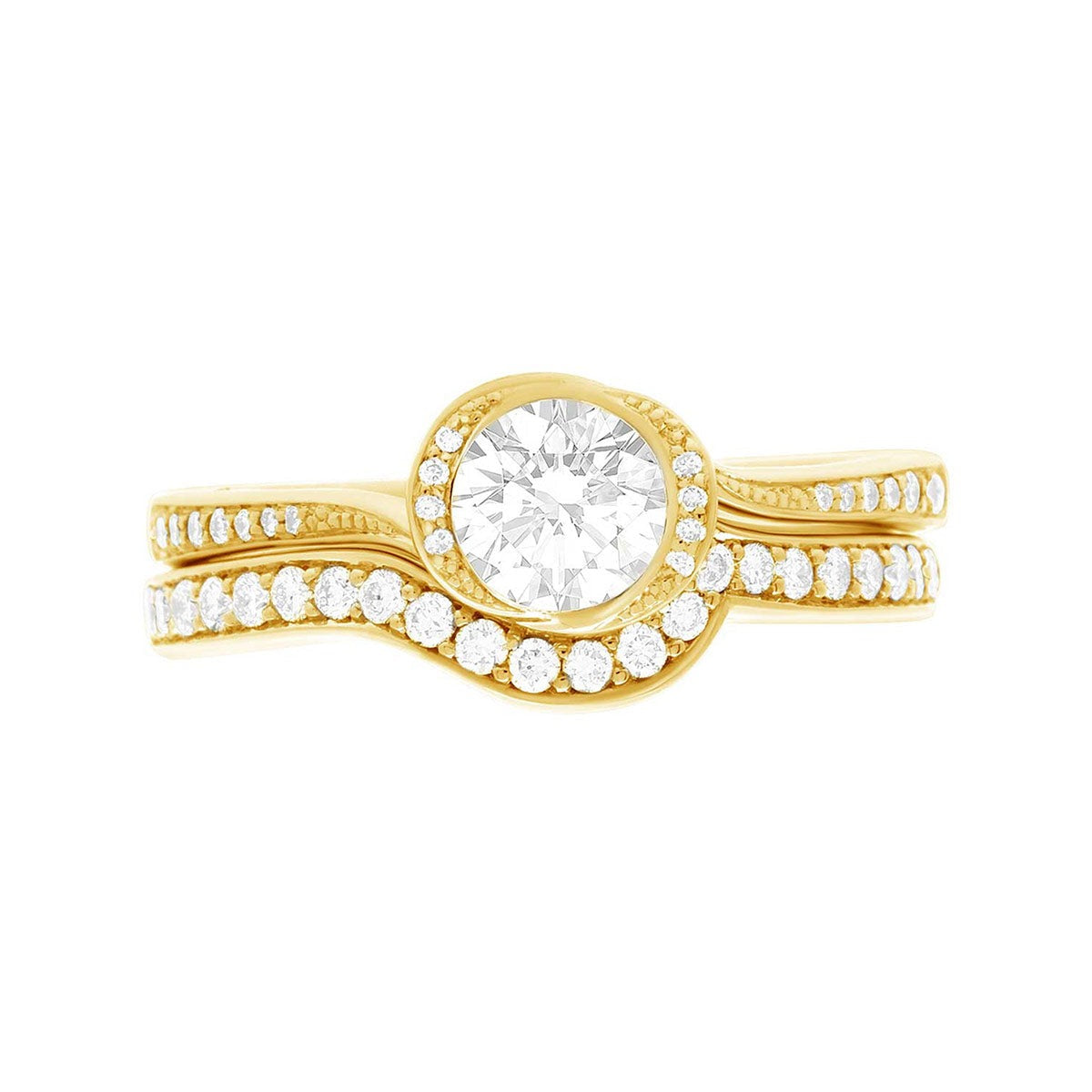 Unusual Halo Engagement Ring in yellow gold with a matching diamond wedding band
