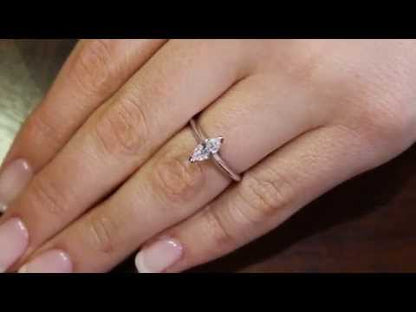 Marquise Shape diamond engagement ring on a womans finger