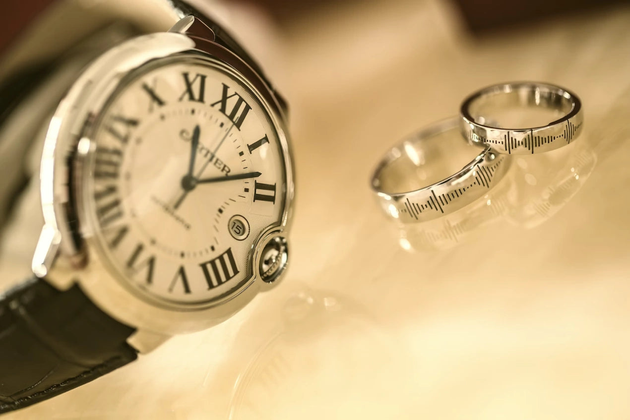 Two Silver-colored Engagement rings neat silver-colored analog watch