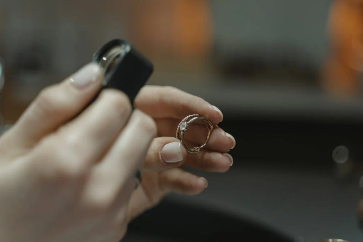 A person holding Diamond ring