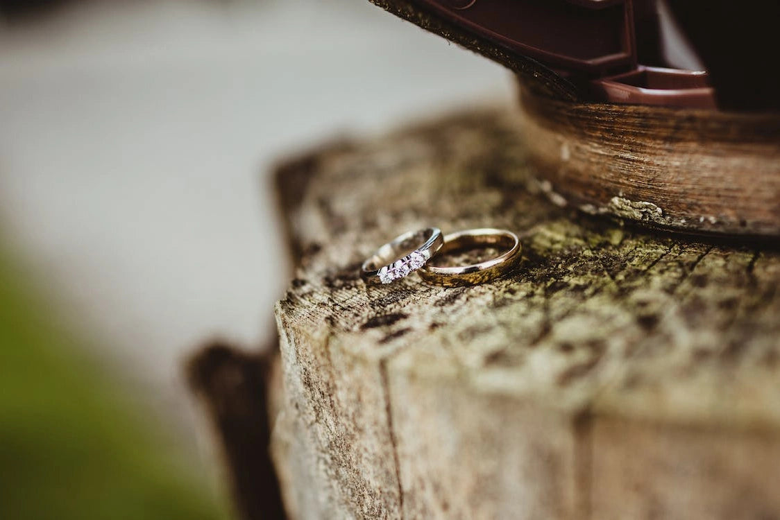 Wedding rings lying on a peace of wood