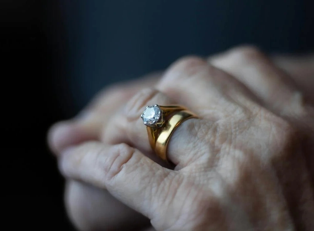 Gold ring on a person's