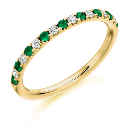 Round Emerald And Diamond Eternity Ring in yellow gold