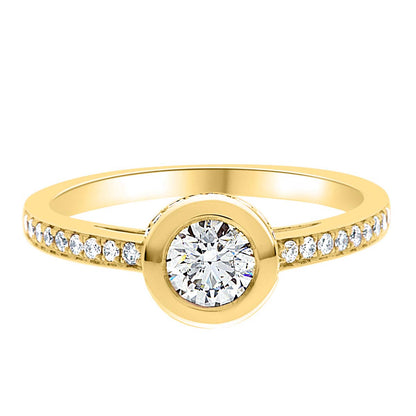 Bezel Engagement Ring made of yellow gold and diamonds, laying flat, with a white background