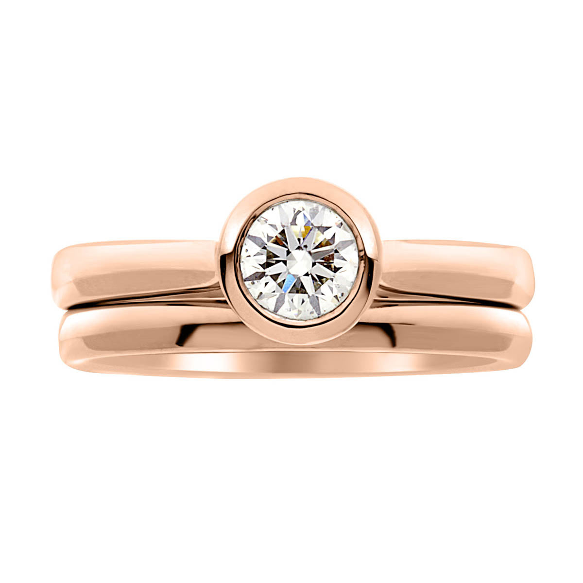 Bezel Set Engagement ring in 18kt yellow gold  with a plain wedding ring