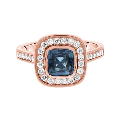 Sapphire Diamond Engagement Ring in rose gold on a white background