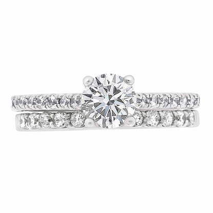 Castell Set Diamond Ring made from platinum pictured with a diamond wedding ring