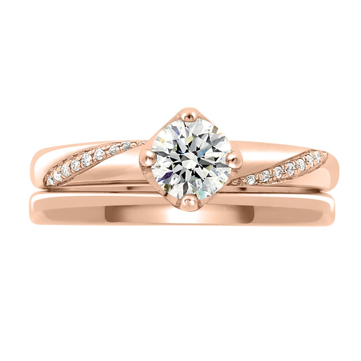 Crossover Band Engagement Ring made from rose gold with a matching plain wedding ring