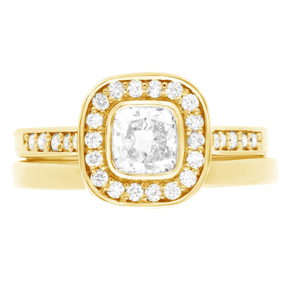 Cushion Cut Bezel Diamond Ring in yellow gold with matching plain gold wedding ring