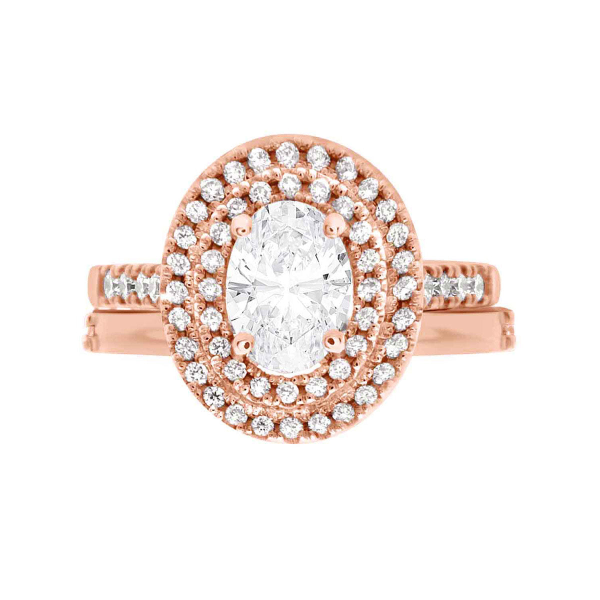Double Halo Oval Engagement Ring In rose gold with a matching plain weddingf ringf