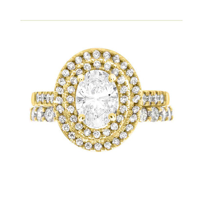 Double Halo Oval Engagement Ring In yellow gold with a matchig diamond set wedding ring