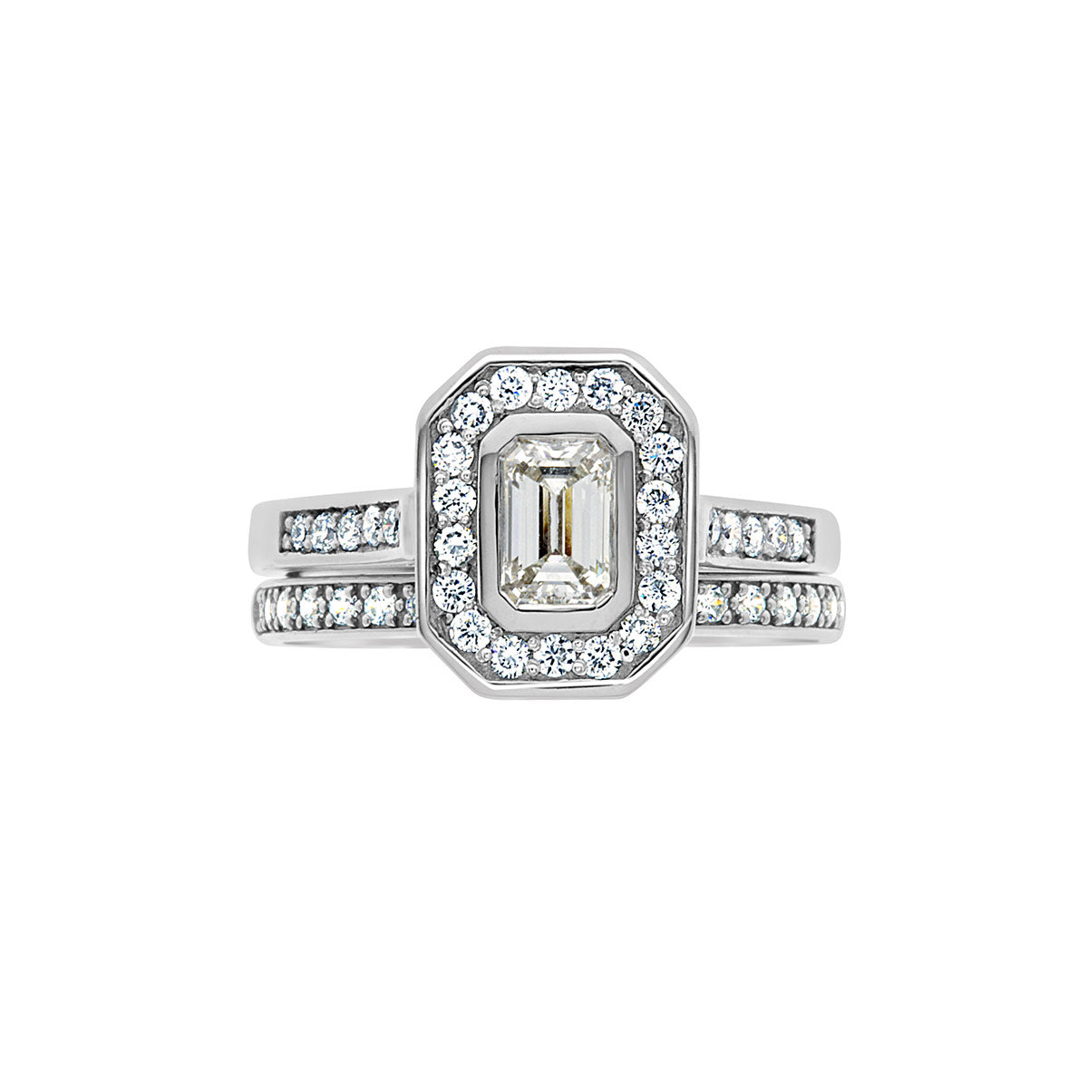 Emerald Cut Halo Ring in white gold with a matching wedding ring