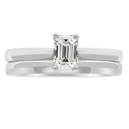 Emerald Cut Ring Solitaire Engagement Ring in platinum with a matching plain platinum wedding ring