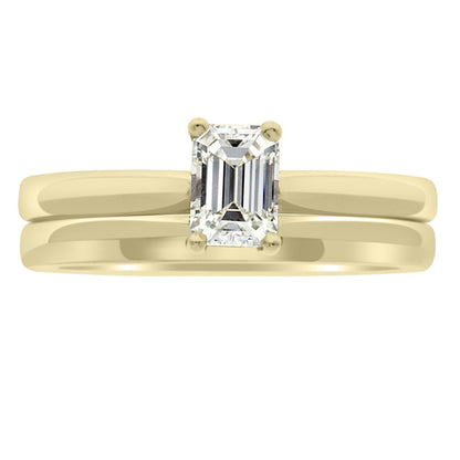 Emerald Cut Ring Solitaire Engagement Ring in yellow gold with a matching plain wedding ring