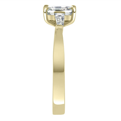 Emerald Cut With Tapered Baguettes in yellow gold in end view