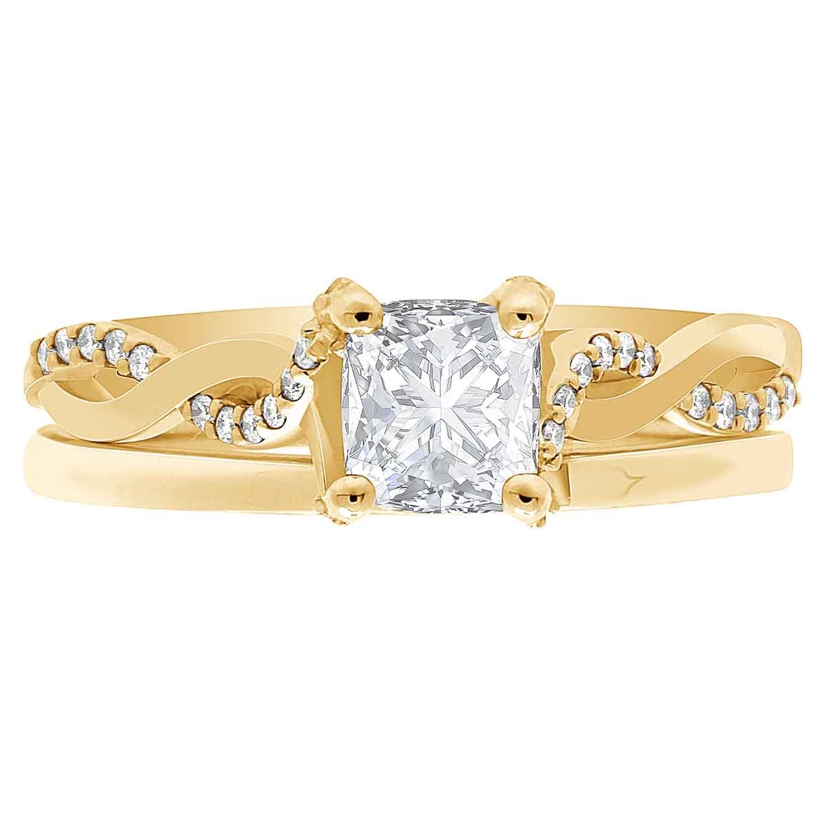 Engagement Ring With Twisted band made in yellow gold pictured with a plain wedding ring