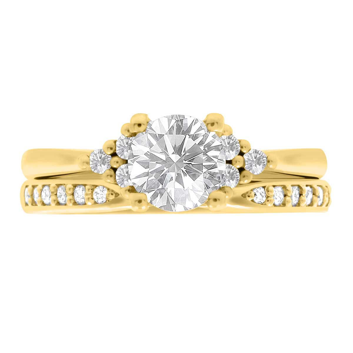 Handmade Engagement Ring in yellow gold with a diamond wedding ring