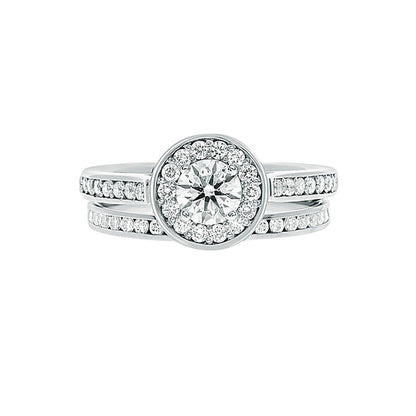 Round Halo Engagement Ring in white gold with a matching diamond wedding band