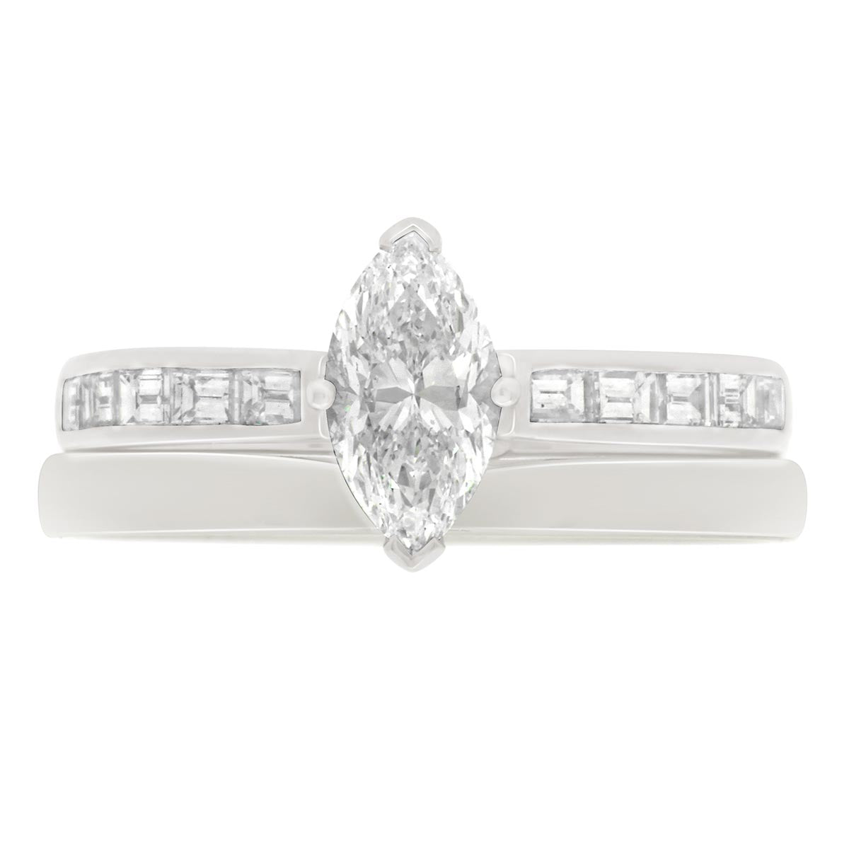 Marquise Diamond Ring made with Platinum pictured with a plain wedding ring