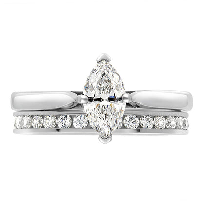 Marquise Solitaire Engagement Ring made from white gold pictured with a diamond set wedding ring