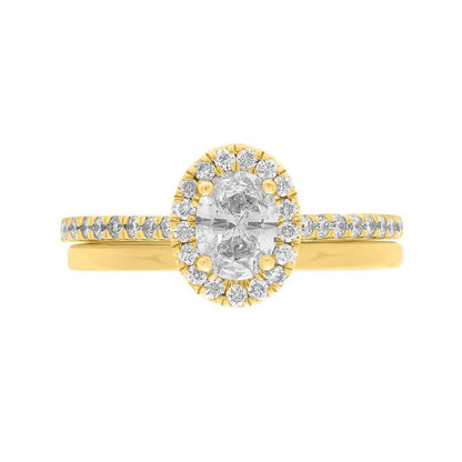 Oval Halo Engagement Ring made of yellow gold pictured with a a matching plain wedding ring