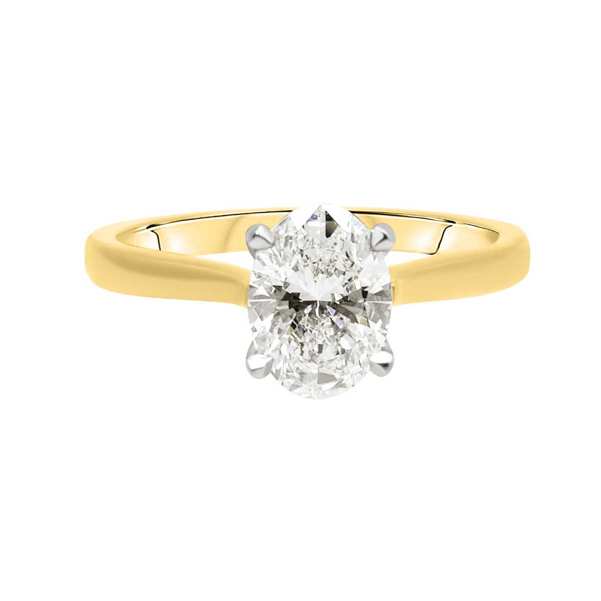 Oval Solitaire with Criss Cross Shank In Yellow laying flat Gold