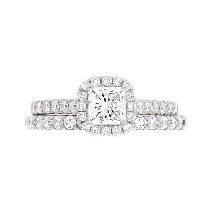 Princess Cut Diamond Halo Ring in white gold with a matching wedding ring