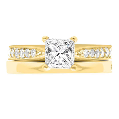 Princess Cut Diamond Solitaire with tapered diamond band in yellow gold with a plain wedding ring