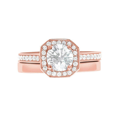 Pavé Halo Diamond Ring in rose Gold laying flat with a matching plain wedding band
