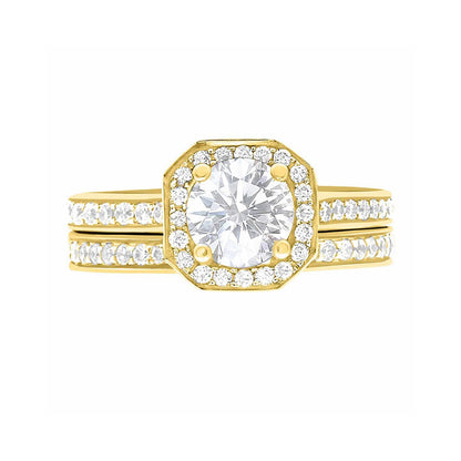 Pavé Halo Diamond Ring in yellow Gold laying flat with a matching diamond set wedding band
