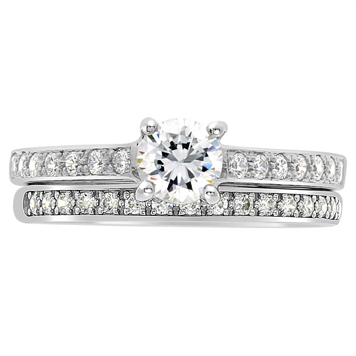 Pavé Diamond Ring manufactured in white gold pictured with a diamond set wedding ring