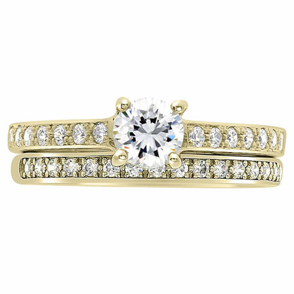 Pavé Diamond Ring manufactured in yellow gold pictured with a diamond set wedding band