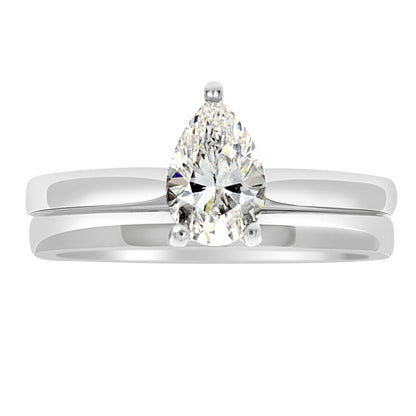 Pear Cut Solitaire Engagement Ring made from white gold with a plain wedding ring