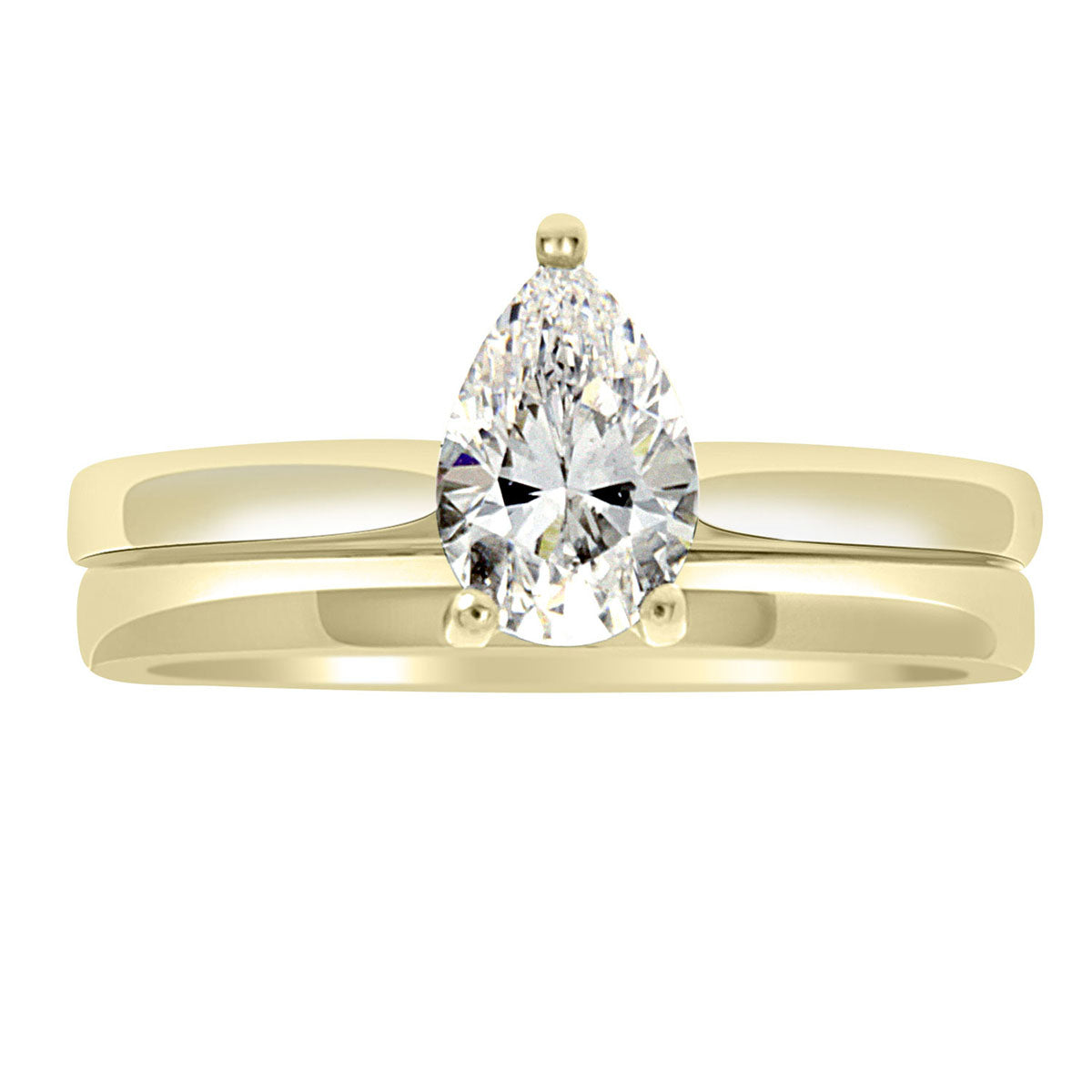 Pear Cut Solitaire Engagement Ring made from yellow gold with a matching wedding ring