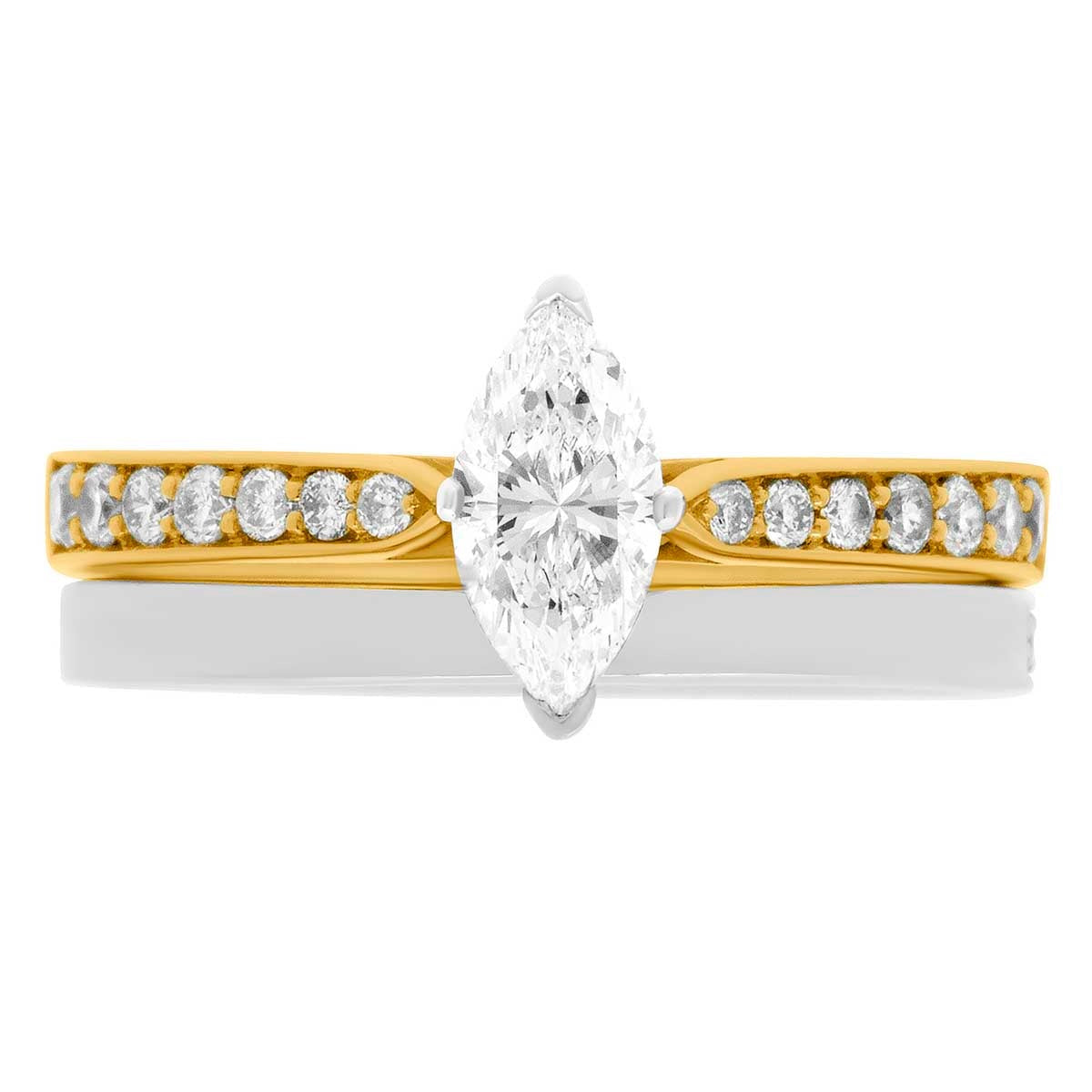 Marquise Engagement Ring made from 18 karat yellow gold with a plain wedding ring