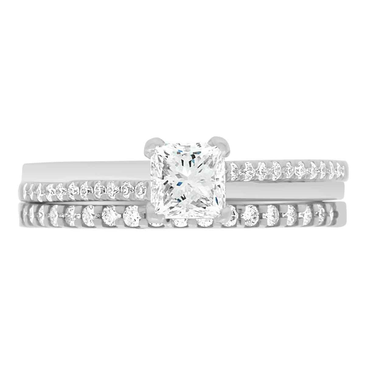 Promise Ring Style made from platinum and pictured with a diamond set wedding ring