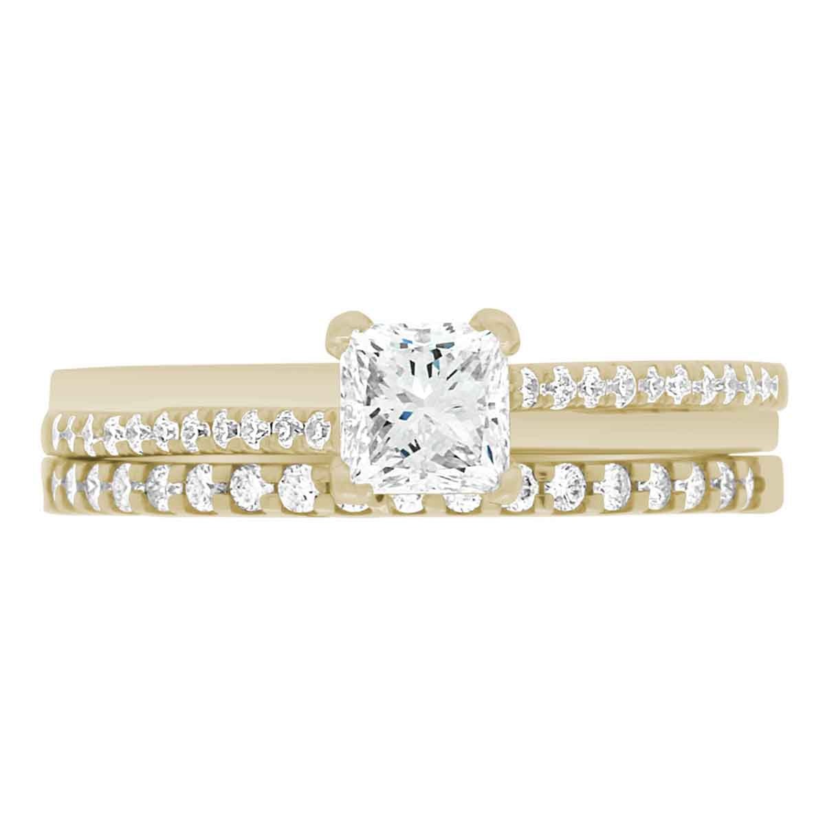 Promise Ring Style made from yellow gold pictured with a diamond wedding ring