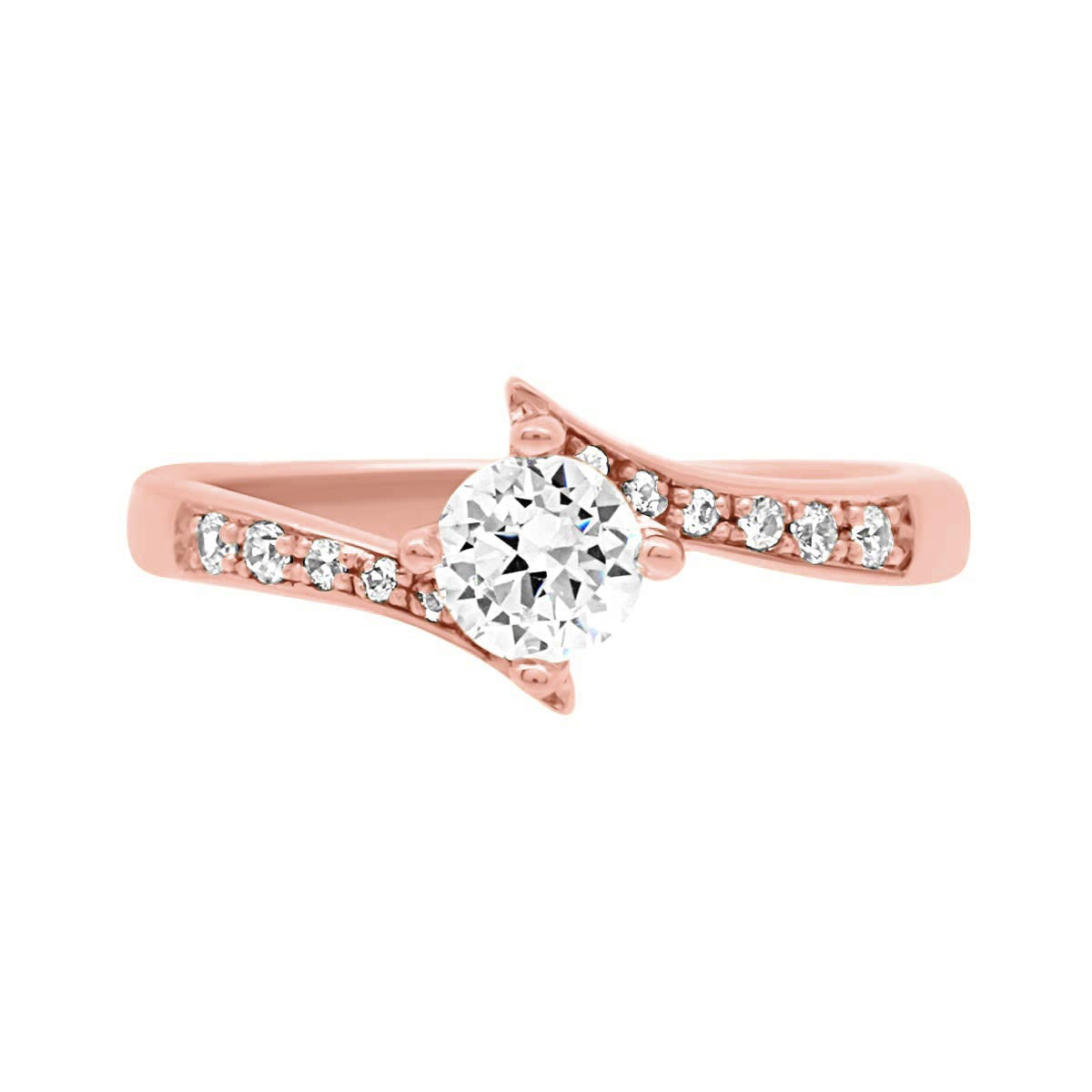 Quirky Diamond Engagement Ring in rose gold and lying flat on a white surface