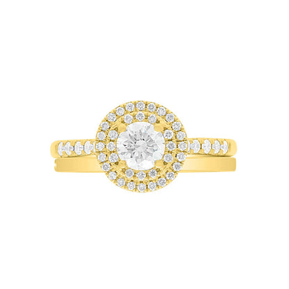 Round Double Halo Engagement Ring made of yellow gold and diamonds laying flat with a matching plain wedding ring